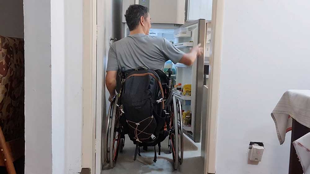 Man climbs CN Tower steps in wheelchair