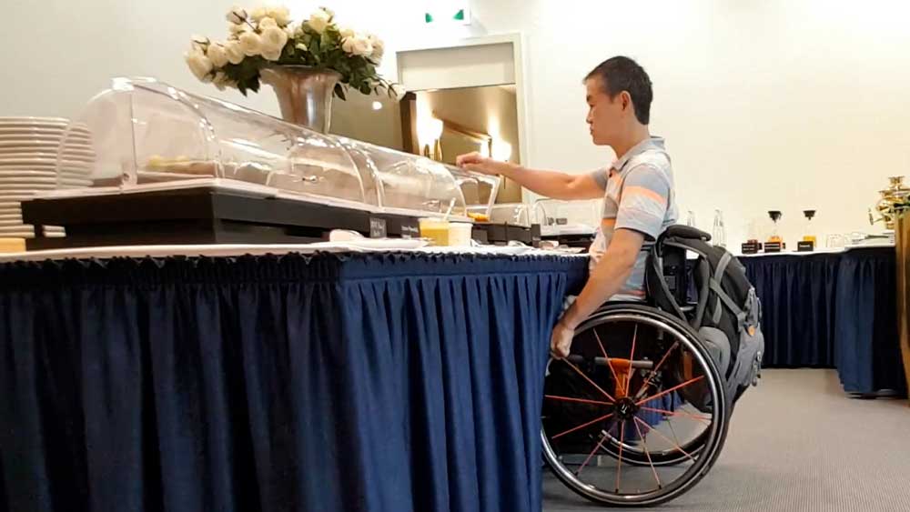 Man climbs CN Tower steps in wheelchair
